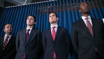 NEW YORK, NY - SEPTEMBER 26: Investigators stand by as acting U.S. Attorney Joon H. Kim speaks during a press conference at the U.S. AttorneyxD5s Office, Southern District of New York, on September 26, 2017 in New York, New York. announce charges of fraud and corruption in college basketball. The acting U.S. Attorney announced Federal criminal charges against ten people, including four college basketball coaches, as well as managers, financial advisors, and representatives of a major international sportswear company. Kevin Hagen/Getty Images/AFP
== FOR NEWSPAPERS, INTERNET, TELCOS & TELEVISION USE ONLY ==