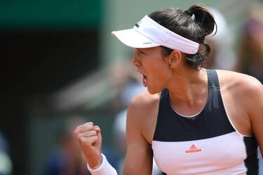 Muguruza sees off Putintseva to reach French Open fourth round