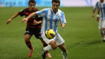Toulalan controla un balón contra el Celta.