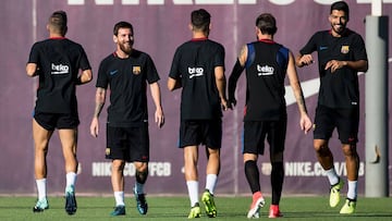 Messi y Luis Su&aacute;rez, durante el &uacute;ltimo entrenamiento del Barcelona.