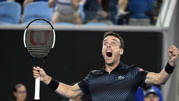 Spain's Roberto Bautista Agut celebrates after defeating Croatia's Marin Cilic in their fourth round match at the Australian Open tennis championships in Melbourne, Australia, Sunday, Jan. 20, 2019. (AP Photo/Andy Brownbill)