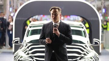 GRUENHEIDE, GERMANY - MARCH 22: Tesla CEO Elon Musk speaks during the official opening of the new Tesla electric car manufacturing plant on March 22, 2022 near Gruenheide, Germany. The new plant, officially called the Gigafactory Berlin-Brandenburg, is pr