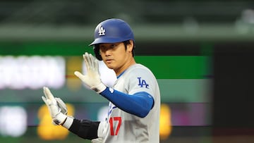 CHICAGO, ILLINOIS - APRIL 07: Shohei Ohtani #17 of the Los Angeles Dodgers reacts after hitting a double against the Chicago Cubs during the eighth inning at Wrigley Field on April 07, 2024 in Chicago, Illinois.   Michael Reaves/Getty Images/AFP (Photo by Michael Reaves / GETTY IMAGES NORTH AMERICA / Getty Images via AFP)