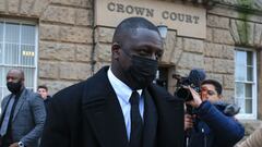 Manchester City and France international footballer Benjamin Mendy (C) leaves after a pre-trial hearing at Chester Crown Court in Chester, northwest England, on February 2, 2022. - Mendy, who has been charged with seven counts of rape, was freed on bail last month with "stringent" conditions, including the surrender of his passport. Mendy, who is accused by five women of seven counts of rape and one of sexual assault, has been in custody since being arrested and charged on August 26 last year. (Photo by Lindsey Parnaby / AFP)