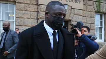 Manchester City and France international footballer Benjamin Mendy (C) leaves after a pre-trial hearing at Chester Crown Court in Chester, northwest England, on February 2, 2022. - Mendy, who has been charged with seven counts of rape, was freed on bail last month with "stringent" conditions, including the surrender of his passport. Mendy, who is accused by five women of seven counts of rape and one of sexual assault, has been in custody since being arrested and charged on August 26 last year. (Photo by Lindsey Parnaby / AFP)