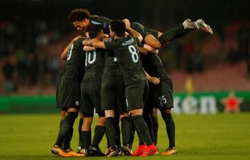 Manchester City's players celebrate John Stones' goal.