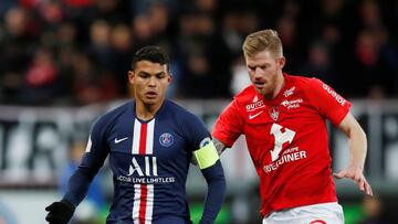 Soccer Football - Ligue 1 - Brest v Paris St Germain - Stade Francis-Le Ble, Brest, France - November 9, 2019 Paris St Germain's Thiago Silva in action with Brest's Gaetan Charbonnier REUTERS/Stephane Mahe