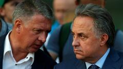 Vitaly Mutko y Dmitry Shlyakhtin.