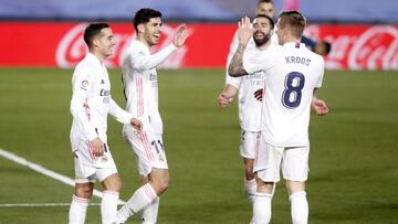 Lucas V&aacute;zquez, Asensio Carvajal y Kroos celebran el gol del balear en el Real Madrid-Celta.
 
