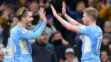 MANCHESTER, ENGLAND - DECEMBER 14: Kevin De Bruyne of Manchester City celebrates after scoring their side's third goal with Jack Grealish during the Premier League match between Manchester City and Leeds United at Etihad Stadium on December 14, 2021