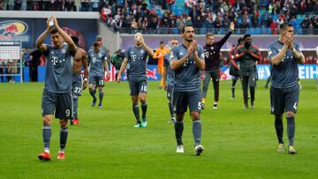 (L-R) Bayern Munich&#039;s Polish forward Robert Lewandowski, Bayern Munich&#039;s German defender Mats Hummels and Bayern Munich&#039;s German defender Niklas Suele react at the end of the German first division Bundesliga football match RB Leipzig vs FC 