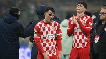 Girona's Spanish defender #16 Alejandro Frances looks dejected at the end of the UEFA Champions League football match between AC Milan and Girona at San Siro stadium in Milan, on January 22, 2025. (Photo by Alberto PIZZOLI / AFP)