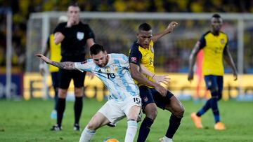 Soccer Football - World Cup - South American Qualifiers - Ecuador v Argentina - Estadio Monumental Banco Pichincha, Guayaquil, Ecuador - March 29, 2022 Argentina's Lionel Messi in action with Ecuador's Carlos Gruezo Pool via REUTERS/Dolores Ochoa