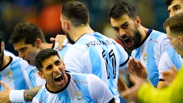 IHF Handball World Championship - Preliminary Round - Argentina v Netherlands - Tauron Arena, Krakow, Poland - January 13, 2023 Argentina's Francisco Andres Lombardi celebrates with teammates REUTERS/Tomasz Markowski