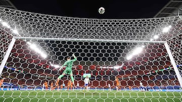Netherlands' goalkeeper #01 Bart Verbruggen jumps to clear the ball during the UEFA Euro 2024 Group D football match between the Netherlands and France at the Leipzig Stadium in Leipzig on June 21, 2024. (Photo by FRANCK FIFE / AFP)