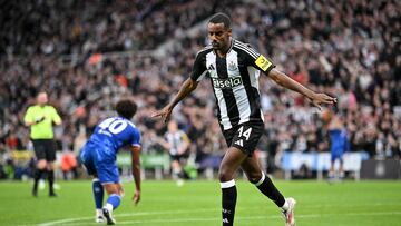 Newcastle United's Swedish striker #14 Alexander Isak celebrates scoring the team's first goal during the English League Cup round of 16 football match between Newcastle United and Chelsea at St James' Park in Newcastle-upon-Tyne, north east England on October 30, 2024. (Photo by ANDY BUCHANAN / AFP) / RESTRICTED TO EDITORIAL USE. No use with unauthorized audio, video, data, fixture lists, club/league logos or 'live' services. Online in-match use limited to 120 images. An additional 40 images may be used in extra time. No video emulation. Social media in-match use limited to 120 images. An additional 40 images may be used in extra time. No use in betting publications, games or single club/league/player publications. /