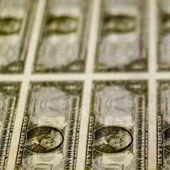 What do the pyramid and the eye on the one-dollar bill mean and what is the symbolism?