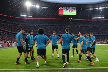 Real Madrid players warming up before the game.