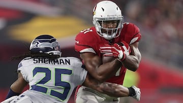 GLENDALE, AZ - OCTOBER 23: Running back David Johnson #31 of the Arizona Cardinals rushes the football against cornerback Richard Sherman #25 of the Seattle Seahawks in the first half of the NFL game at the University of Phoenix Stadium on October 23, 2016 in Glendale, Arizona.   Christian Petersen/Getty Images/AFP
 == FOR NEWSPAPERS, INTERNET, TELCOS &amp; TELEVISION USE ONLY ==