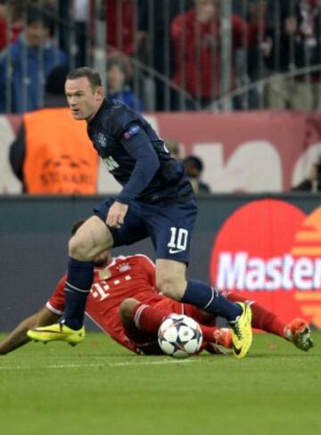 Wayne Rooney y Jerome Boateng.