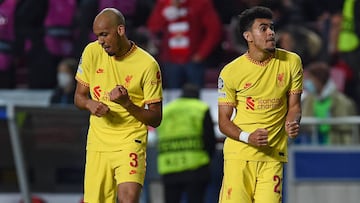 LISBON, PORTUGAL - APRIL 05: (THE SUN OUT. THE SUN ON SUNDAY OUT) Luis Diaz of Liverpool dances with Fabinho of Liverpool after scoring the third goal during the UEFA Champions League Quarter Final Leg One match between SL Benfica and Liverpool FC at Estadio da Luz on April 05, 2022 in Lisbon, Portugal. (Photo by John Powell/Liverpool FC via Getty Images)