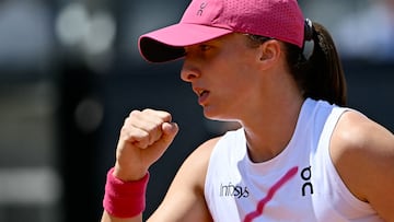 Poland's Iga Swiatek celebrates a point against USA's Madison Keys during the Women's WTA Rome Open tennis tournament at Foro Italico in Rome on May 14, 2024. (Photo by Filippo MONTEFORTE / AFP)