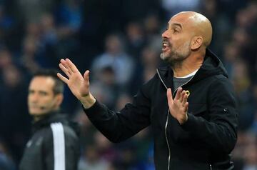 Guardiola gestures at referee Antonio Mateu Lahoz at half time of Tuesday's Champions League clash.