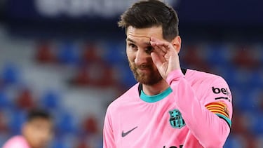 Barcelona's Argentinian forward Lionel Messi looks on during the Spanish league football match Levante UD against FC Barcelona at the Ciutat de Valencia stadium in Valencia on May 11, 2021. (Photo by JOSE JORDAN / AFP)