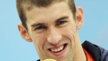 <b>HISTORIA.</b> El nadador estadounidense se ha convertido en el deportista que más medallas de oro ha conquistado.