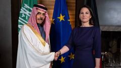 Saudi Arabia's Foreign Minister Faisal bin Farhan Al Saud (L) shakes hands with German Foreign Minister Annalena Baerbock during the Munich Security Conference (MSC) in Munich, southern Germany, on February 17, 2023. (Photo by Sven Hoppe / POOL / AFP) (Photo by SVEN HOPPE/POOL/AFP via Getty Images)