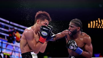 NEW YORK, NEW YORK - JUNE 14: Andy Cruz of Cuba, black shorts, fights Hironori Mishiro of Japan, white shorts, during a IBF world lightweight title eliminator fight at The Theater at Madison Square Garden on June 14, 2025 in New York City. Adam Hunger/Getty Images/AFP (Photo by Adam Hunger / GETTY IMAGES NORTH AMERICA / Getty Images via AFP)