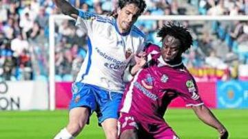 <b>CHOQUE DE ESTILOS. </b>Jorge López pugna con Komé.