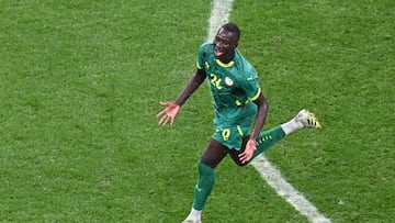 TOPSHOT - Senegal's midfielder #26 Pape Gueye celebrates after the Africa Cup of Nations (CAN) final football match between Senegal and Morocco at the Prince Moulay Abdellah Stadium in Rabat on January 18, 2026. (Photo by Paul ELLIS / AFP)