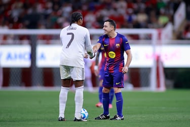 Edwin Congo y Xavi Hernández