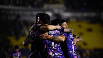 America's Chilean forward #11 Victor Davila (unseen) celebrates with teammates after scoring during the Liga MX Clausura football match between America and San Luis at the Ciudad de los Deportes stadium in Mexico City on January 28, 2025. (Photo by Rodrigo Oropeza / AFP)