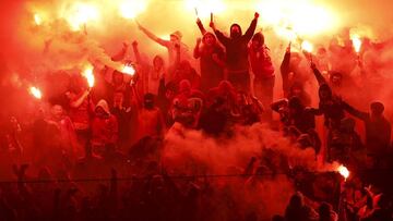 Galatasaray fans light flares to celebrate their goal against Fenerbahce during the Turkish Super League derby soccer match between Galatasaray and Fenerbahce in Istanbul, Turkey in this April 6, 2014 file photo. Ambitions to secure a place at international soccer&#039;s top table have come at a high cost for Turkey&#039;s leading clubs, which are now struggling to navigate a sea of debt after years of heavy spending. REUTERS/Murad Sezer/Files