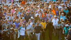 Phil Mickelson and his caddie, Tim Mickelson