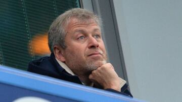 (FILES) In this file photo taken on February 21, 2016, Chelsea's Russian owner Roman Abramovich watches the FA cup fifth round football match between Chelsea and Manchester City at Stamford Bridge in London. - Canadian Prime Minister Justin Trudeau said on March 11, 2022, that Canada is imposing new sanctions on Russian oligarchs including Abramovich in punishment for President Vladimir Putin's invasion of Ukraine. Speaking in Warsaw, Trudeau said the billionaire owner of Chelsea football club and four other individuals would "be prevented from dealings in Canada and their assets will be frozen." (Photo by GLYN KIRK / AFP) / RESTRICTED TO EDITORIAL USE. No use with unauthorized audio, video, data, fixture lists, club/league logos or 'live' services. Online in-match use limited to 75 images, no video emulation. No use in betting, games or single club/league/player publications. /
