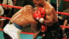 How much are Evander Holyfield’s ‘bite fight’ boxing gloves selling for at auction?