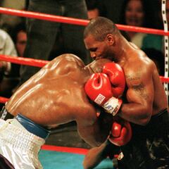 How much are Evander Holyfield’s ‘bite fight’ boxing gloves selling for at auction?