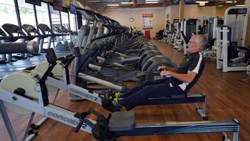 Steve Hall, one of two people at the gym, works out at Fitness 19 in Lilburn, Georgia on April 24, 2020. - Georgia Governor Brian Kemp eased restrictions allowing some businesses such as barber shops to reopen to get Georgia&#039;s economy going during th