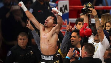Manny Pacquiao of the Philippines celebrates his victory over Jessie Vargas of Las Vegas as he becomes WBO welterweight champion at the Thomas &amp; Mack Center in Las Vegas, Nevada, U.S., November 5, 2016. REUTERS/Las Vegas Sun/L.E. Baskow