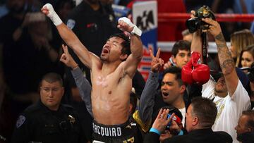 Manny Pacquiao of the Philippines celebrates his victory over Jessie Vargas of Las Vegas as he becomes WBO welterweight champion at the Thomas &amp; Mack Center in Las Vegas, Nevada, U.S., November 5, 2016. REUTERS/Las Vegas Sun/L.E. Baskow