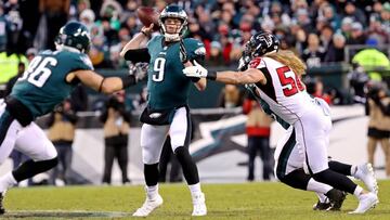 Jan 13, 2018; Philadelphia, PA, USA; Philadelphia Eagles quarterback Nick Foles (9) throws a pass against Atlanta Falcons defensive end Brooks Reed (50) during the second quarter in the NFC Divisional playoff game at Lincoln Financial Field. Mandatory Credit: Bill Streicher-USA TODAY Sports