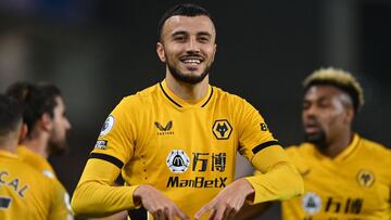 Wolverhampton Wanderers' Moroccan midfielder Romain Saiss celebrates after scoring the opening goal of the English Premier League football match between Brighton and Hove Albion and Wolverhampton Wanderers at the American Express Community Stadium in