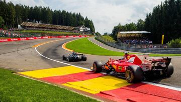 SPA, BELGIUM - AUGUST 27: Lewis Hamilton of Mercedes and Great Britain leads Sebastian Vettel of Ferrari and Germany at the restart during the Formula One Grand Prix of Belgium at Circuit de Spa-Francorchamps on August 27, 2017 in Spa, Belgium. (Photo by Peter J Fox/Getty Images)