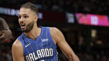 Orlando Magic's Evan Fournier (10), from France, drives past Cleveland Cavaliers' Jeff Green (32) in the second half of an NBA basketball game, Saturday, Oct. 21, 2017, in Cleveland. (AP Photo/Tony Dejak)
