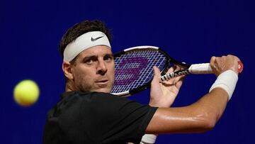 Argentine tennis player Juan Martin Del Potro returns a ball to Argentine Federico Delbonis during the ATP 250 Argentina Open tennis tournament in Buenos Aires, on February 8, 2022. (Photo by Juan Mabromata / AFP)