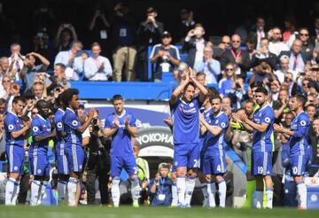 John Terry is given a guard of honour by his team mates as he leaves the pitch at Stamford Bridge.