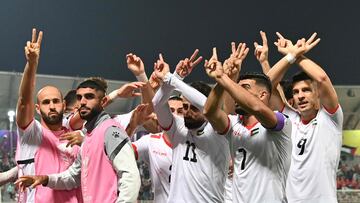 Palestine's forward #11 Oday Dabbagh (C) celebrates with teammates scoring the first goal during the Qatar 2023 AFC Asian Cup Group C football match between Hong Kong and Palestine at the Abdullah bin Khalifa Stadium in Doha on January 23, 2024. (Photo by Hector RETAMAL / AFP)
